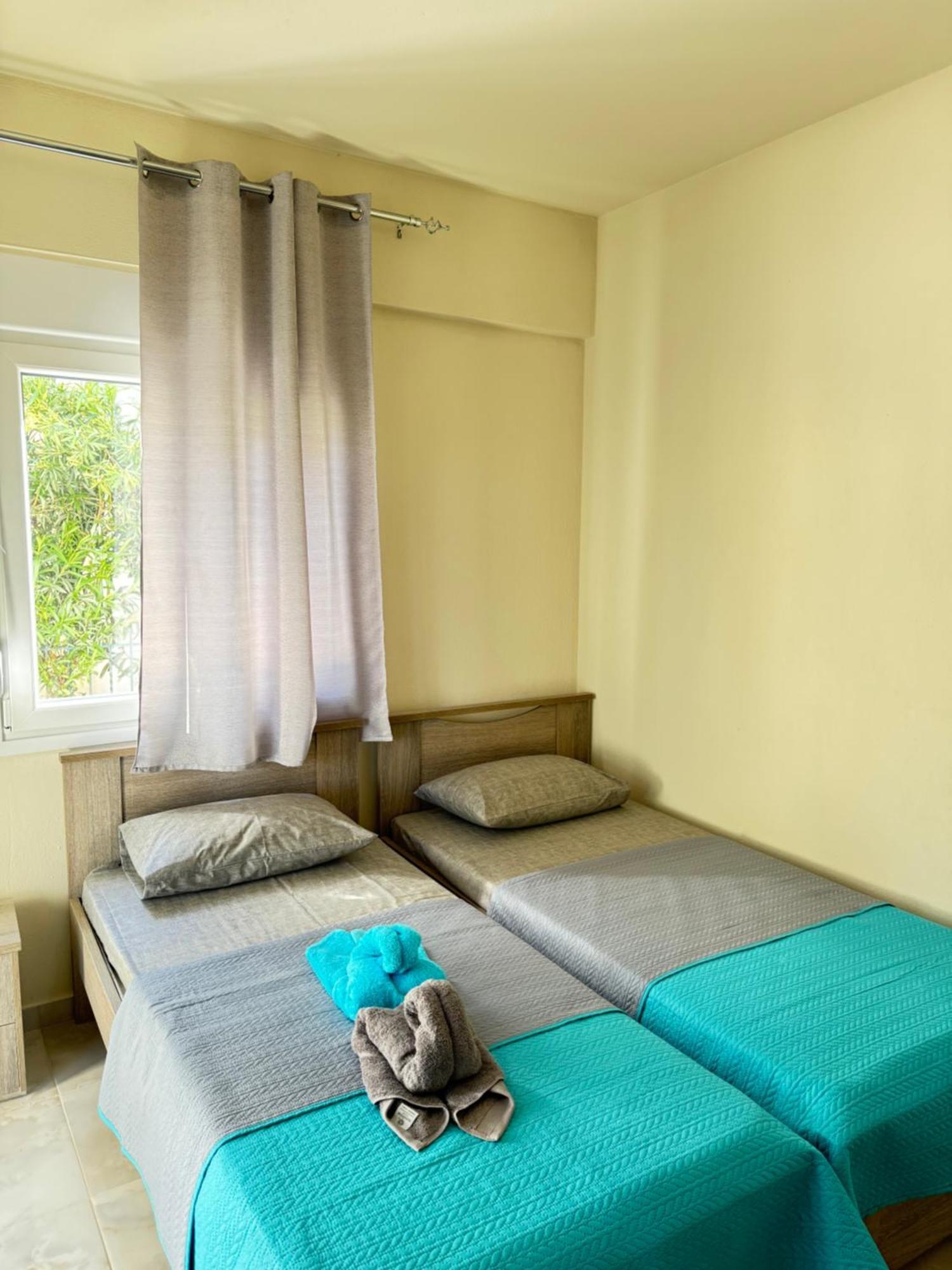 Adoniss Apartmentss ปาลาเรีย ดิโอนิซีอู ภายนอก รูปภาพ